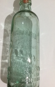 Glass bottle, Marchant & Co, 1915