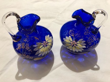 Glass jugs, circa 1900