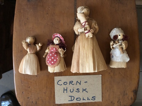 A set of nine assorted clothed handmade miniature dolls for children or display made from corn husks, pegs, straw and wood. 