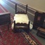 Five pieces of highly decorated wooden doll's furniture: washstand, bed, wardrobe, chest of drawers, towel rail and clothes dryer.