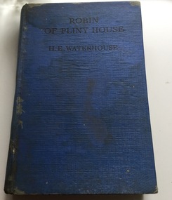 A blue cloth covered hardcover children's book, Robin of Pliny House: A School Story.