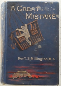 The cover has gold lettering for the title on a blue background with a picture of a boy climbing into a hot air balloon basket.