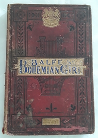  Red cover has ornate detailed pattern around the title, Bohemian Girl.