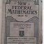 The grey covered textbook Whitcombe's New Federal Mathematics is very badly damaged with torn front and back covers. Lance Sebire Wandin Yallock is written at the top of the front cover