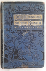 A blue hardcover book with the title The Treasure on the Beach in a gold boxa t the top of the cover. The word Illustrated is in gold lettering below. A black floral pattern  covers the book.