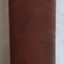 A red covered Weather Almanac from 1894 - 1901 with various tables, maps, diagrams and general information for Victorians.