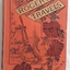 A orange covered fiction book about two boys and their travels overseas in Europe in the late 1800's. Has strong moral religious themes. 