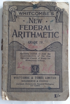 A grey covered paperback Arithmetic textbook for Grade IV for students in Victorian State Schools.
