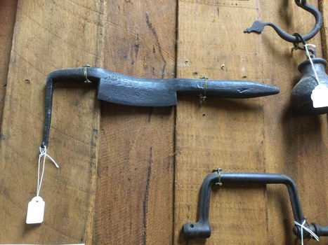 An iron handmade woodworking tool used to shave wood. 