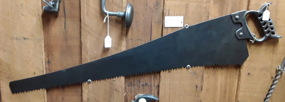 An all steel docking saw used to cut rough wood made approximately 1890