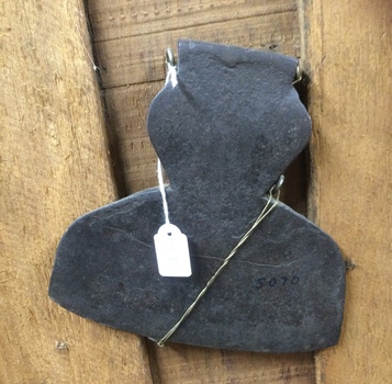 A forged steel broad axe head with no handle