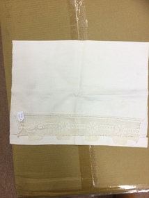 Embroidered cream hand towel with no damage. 