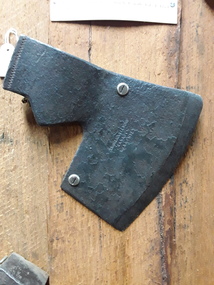 A forged steel long winged axe head with a "Japanned" enamel finish.