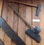 A steel forged wooden handled large broad axe used for squaring up posts and to shape timber.