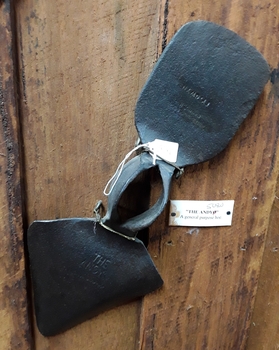 A double headed steel  hoe used for digging and making furrows.