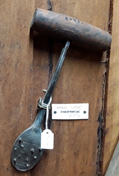A small steel headed bale hook (grab hook) with points on the head to help handle bagged goods.