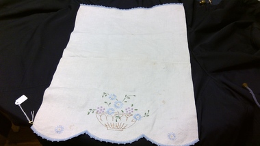 Hand towel with blue and pink embroidered flowers