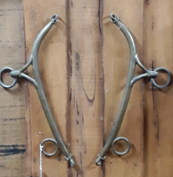 A pair of brass horse hames with four rings which attaches to a horse's collar.
