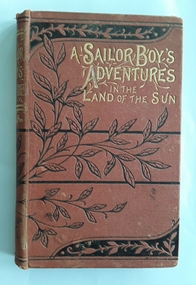 A small tan hardcover children's fiction book - A Sailor Boy's Adventure in the Land of the Sun by James Nunn 