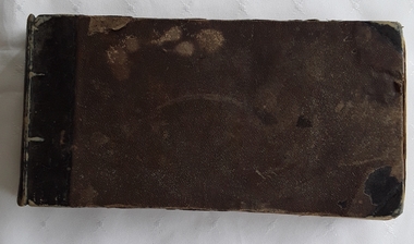A very damaged antique brown and black covered introduction to singing music book. 