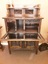 A beautifully hand carved ornate wooden cocktail cabinet with female busts and mythical beasts.