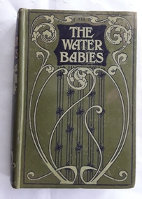An olive green hardcover children's fiction book, The Water Babies by Charles Kingsley with Art Nouveau decorated covers.