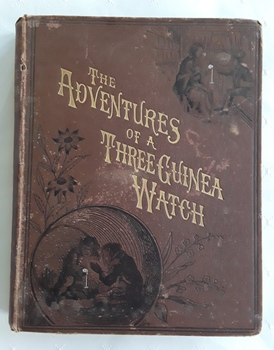 A vintage early 1800'A brown hardcover children's book with the title The Adventures of a Three Guinea Watch written in gold letters.