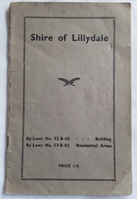  A grey small booklet stapled on the left side with the title Shire of Lillydale printed at the top of the front cover.