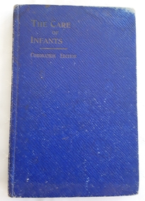 A small blue hardcover book with the title printed in gold lettering at the top of the front cover -The Care of Infants.