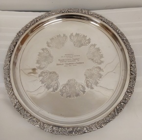 A large 1960's heavy silver plated Presentation Platter with a leaf trim.