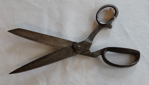 A pair of heavy vintage large hand forged steel dressmaking, tailors shears. 