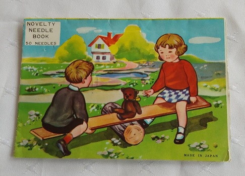 A vintage Novelty Needle Book made in Japan with 50 needles mounted inside a pop up card.