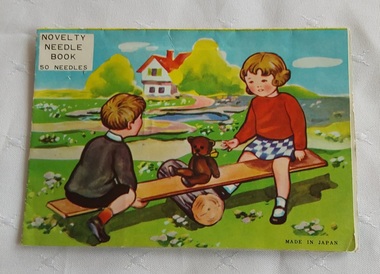 A vintage Novelty Needle Book made in Japan with 50 needles mounted inside a pop up card.