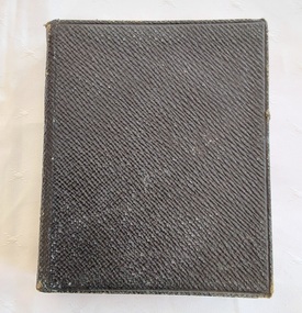 A small black self patterned leatherette softcover book, The Primitive Methodist Hymnal with Supplement. 