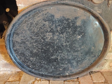 A very large damaged vintage Japan black metal oval tray.