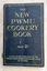 A small vintage dark blue paperback The New P.W.M.U. Cookery Book 