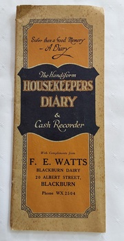A faded and stained tall narrow pale green 1933 Handiform Housekeepers Diary & Cash recorder.
