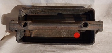 A large vintage alloy metal heavy rectangular meat press. 