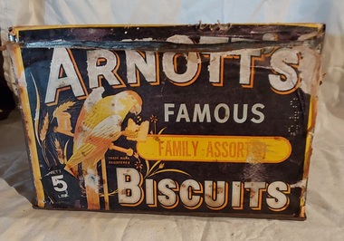 An antique metal ARNOTT'S Famous Family Assorted Biscuits tin with a parrot on the front. NETT 5LBS 645. 