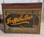 A large rectangular Griffiths Bros Choice Tea Net 7lbs. 1834 - 1934, metal storage tin with a hinged lid. 