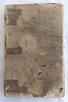 A damaged small brown cardboard Saw Millers' Complete Log and Timber Ready Reckoner book. 