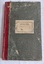 A large green cloth paper wavy patterned covered Norman Bros., Leger Book with burgundy tape on the spine. T