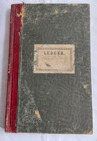 A large green cloth paper wavy patterned covered Norman Bros., Leger Book with burgundy tape on the spine. T