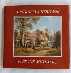 A brown hardcover landscape format book with a red dust jacket which has a large coloured painting of a country cottage.