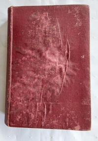 A damaged vintage red covered fiction book, The Virginians by W M. Thackeray.