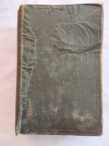 An antique green covered thick book titled: The Horse, in the Stable and Field: His Varieties, Management in Health and Disease, Anatomy, Physiology.