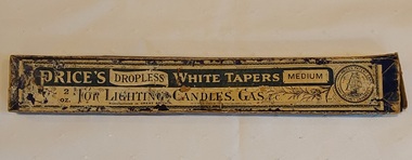 A long thin vintage rectangular cardboard box of three pieces of used thin Price's Dropless White Tapers Medium, for lighting candles, gas etc.