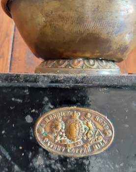 A nineteenth century, cast iron coffee mill, with brass fittings.