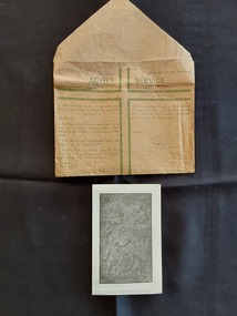 A small vintage brown paper WWII AUSTRALIAN Active Service envelope with a small folded paper souvenir from Gethsemene, Jerusalem.