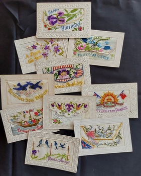 10 beautiful hand embroidered silk postcards from WW1 sent home to loved ones. Two Christmas cards included.